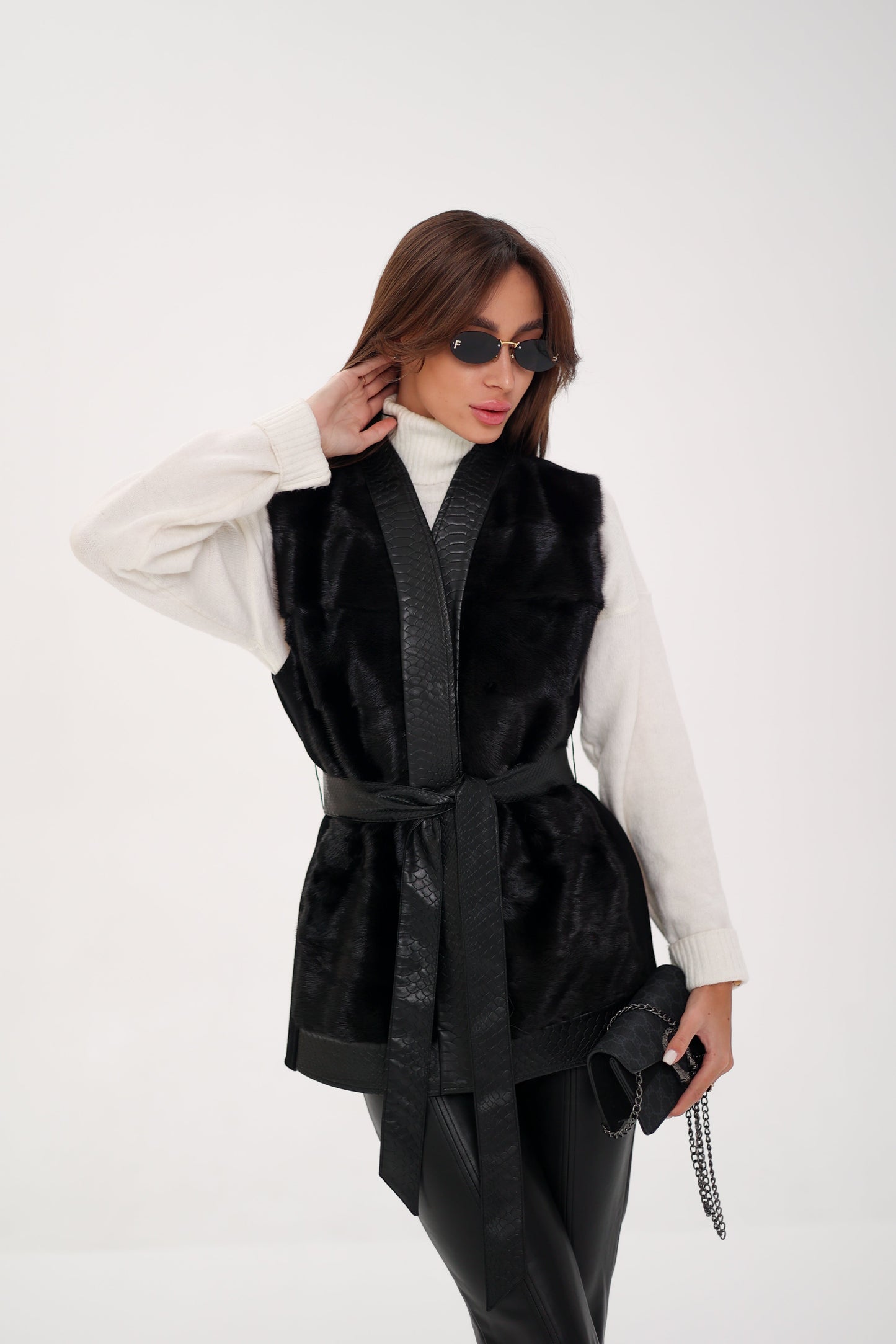 Gilet en laine avec garniture en cuir et fourrure de vison véritable