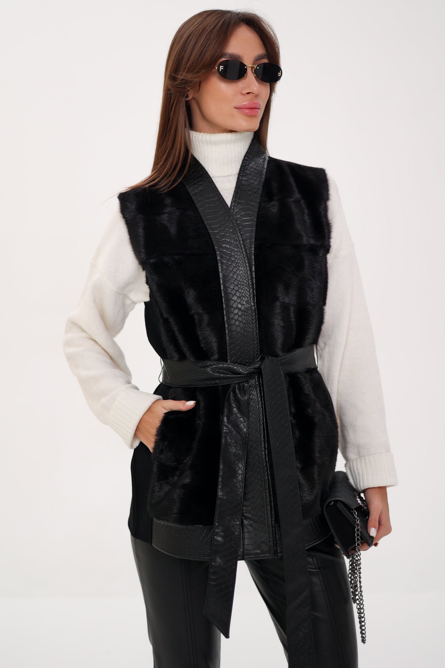 Gilet en laine avec garniture en cuir et fourrure de vison véritable