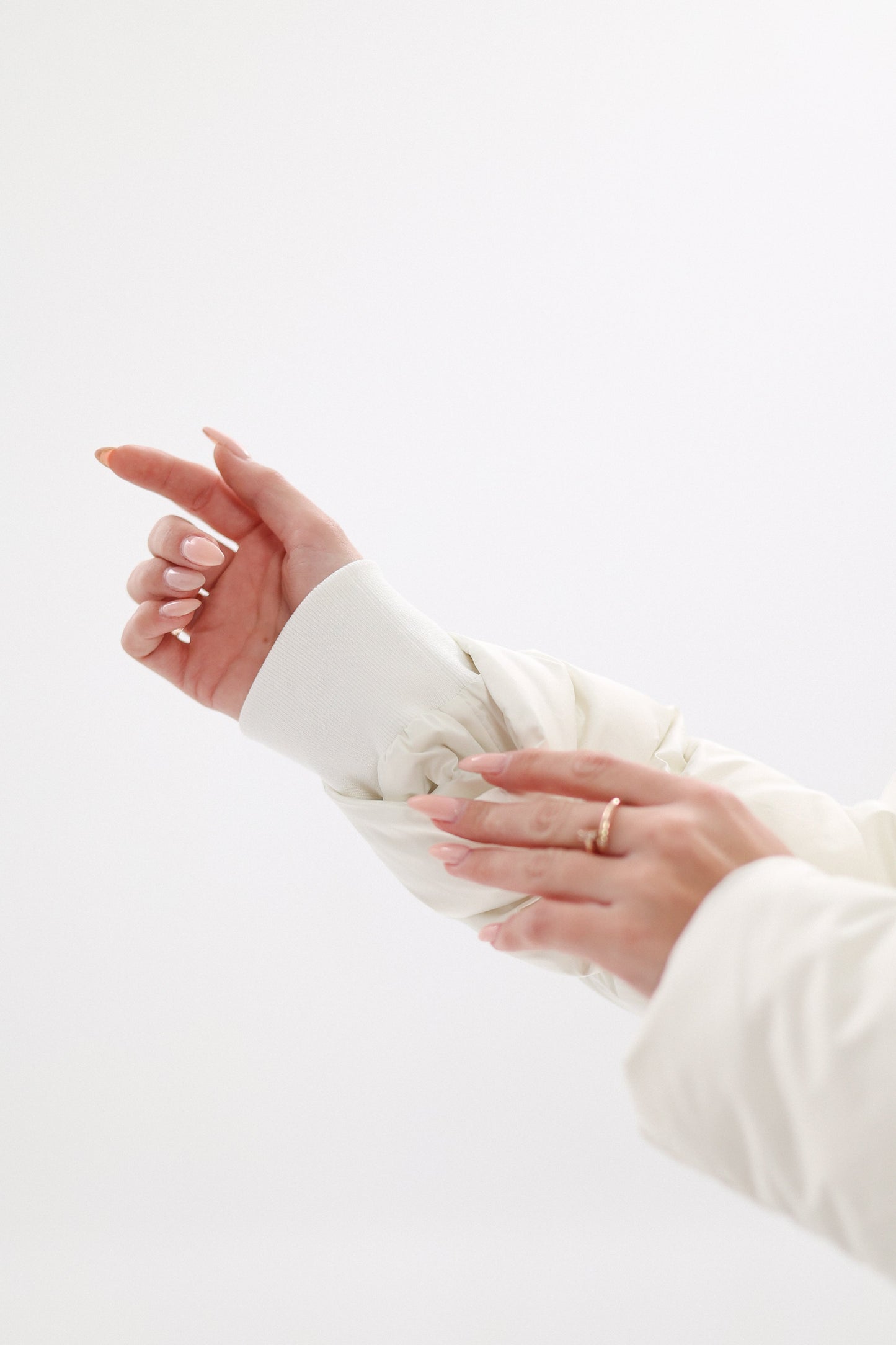 Manteau en duvet avec bordure en fourrure véritable