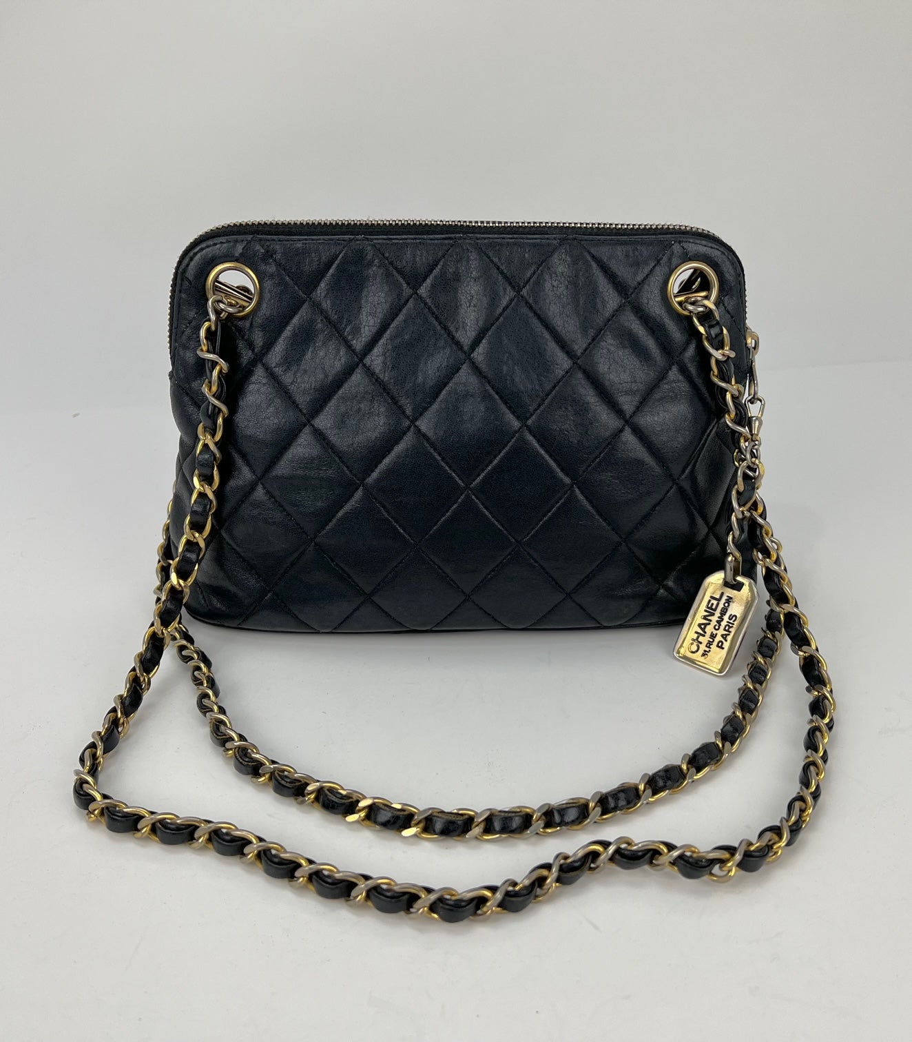 Sac CHANEL en cuir d'agneau matelassé avec chaîne, mini sac à bandoulière noir vintage, d'occasion