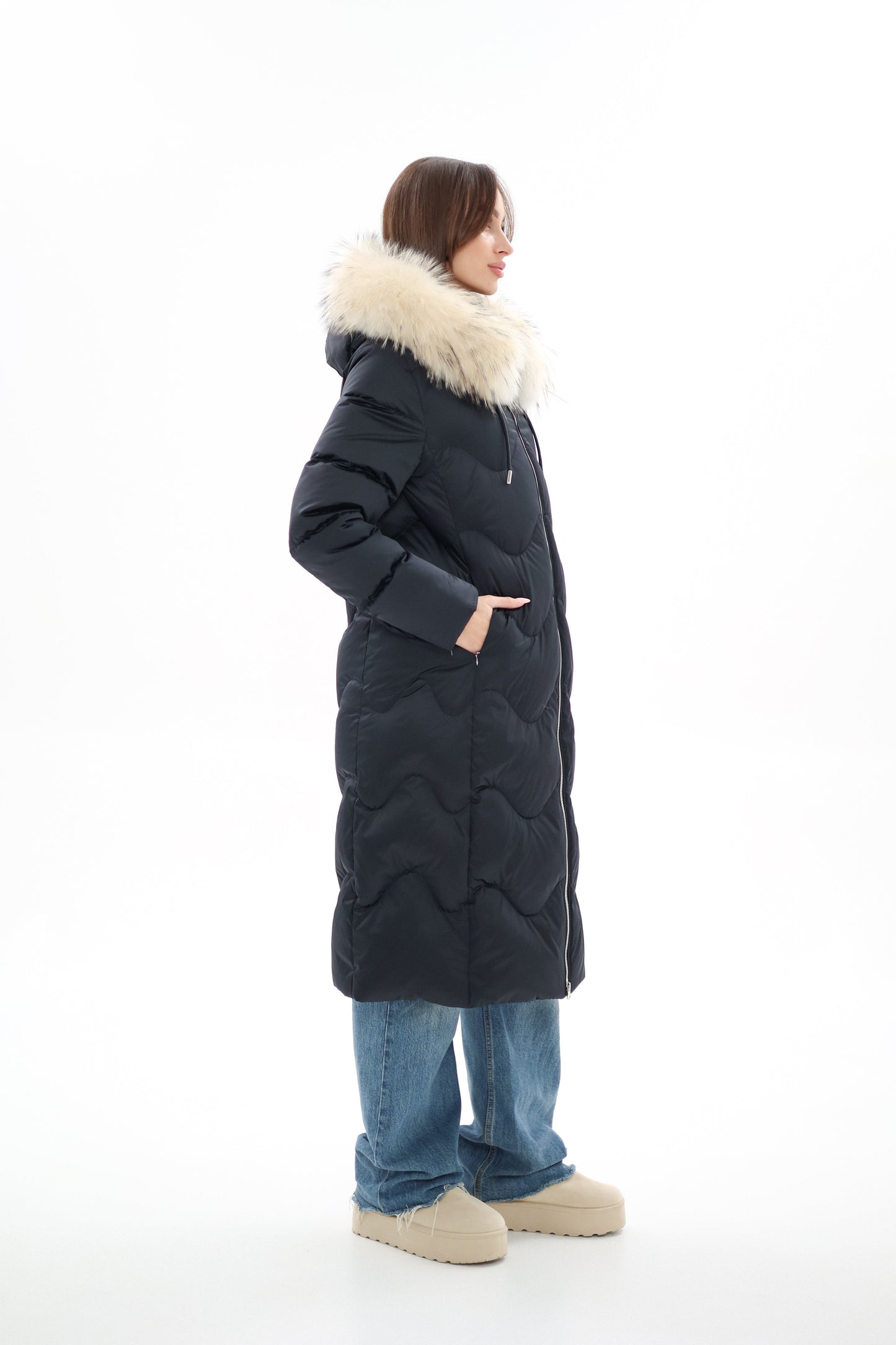 Manteau en duvet avec bordure en fourrure véritable