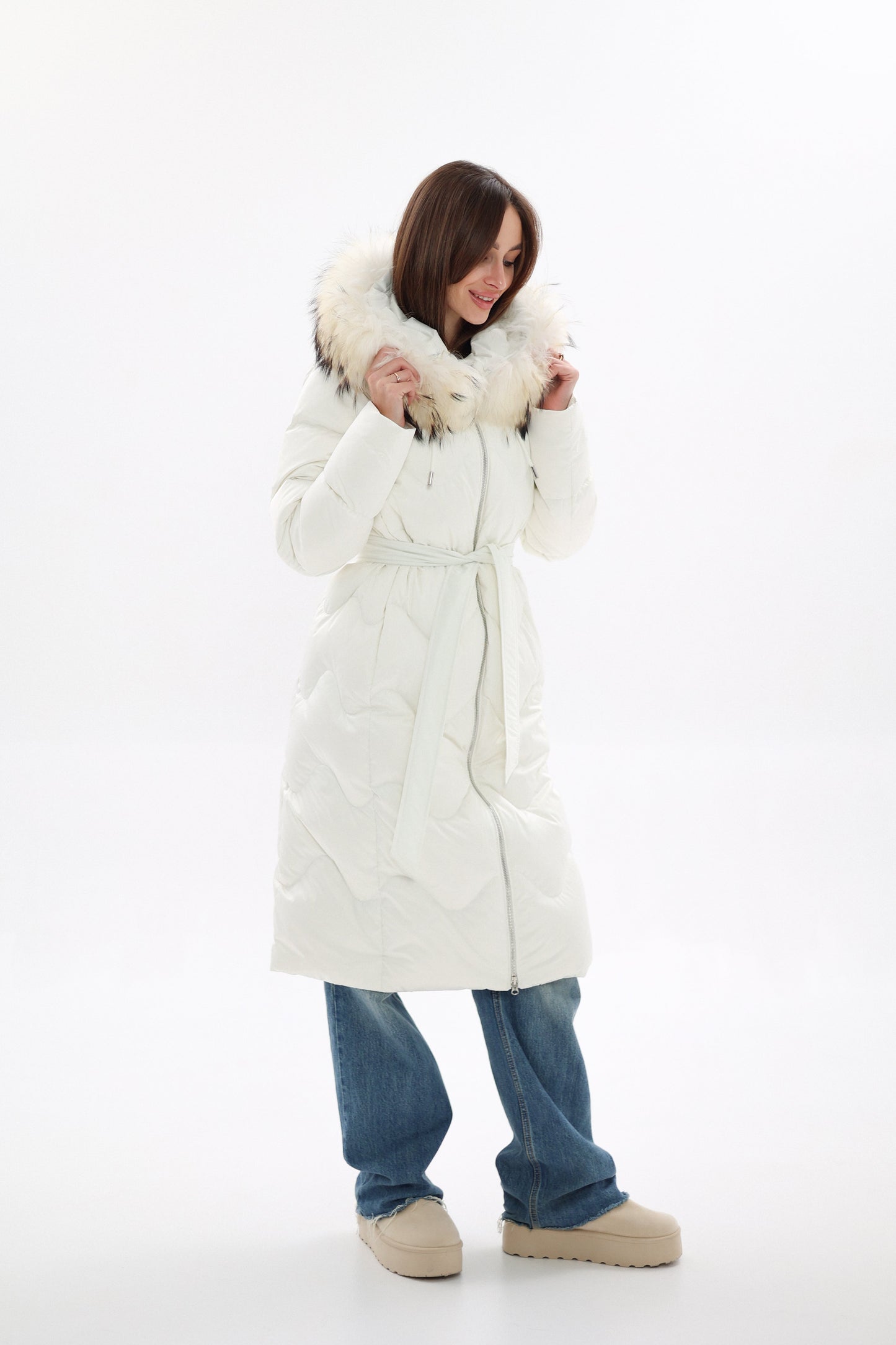 Manteau en duvet avec bordure en fourrure véritable