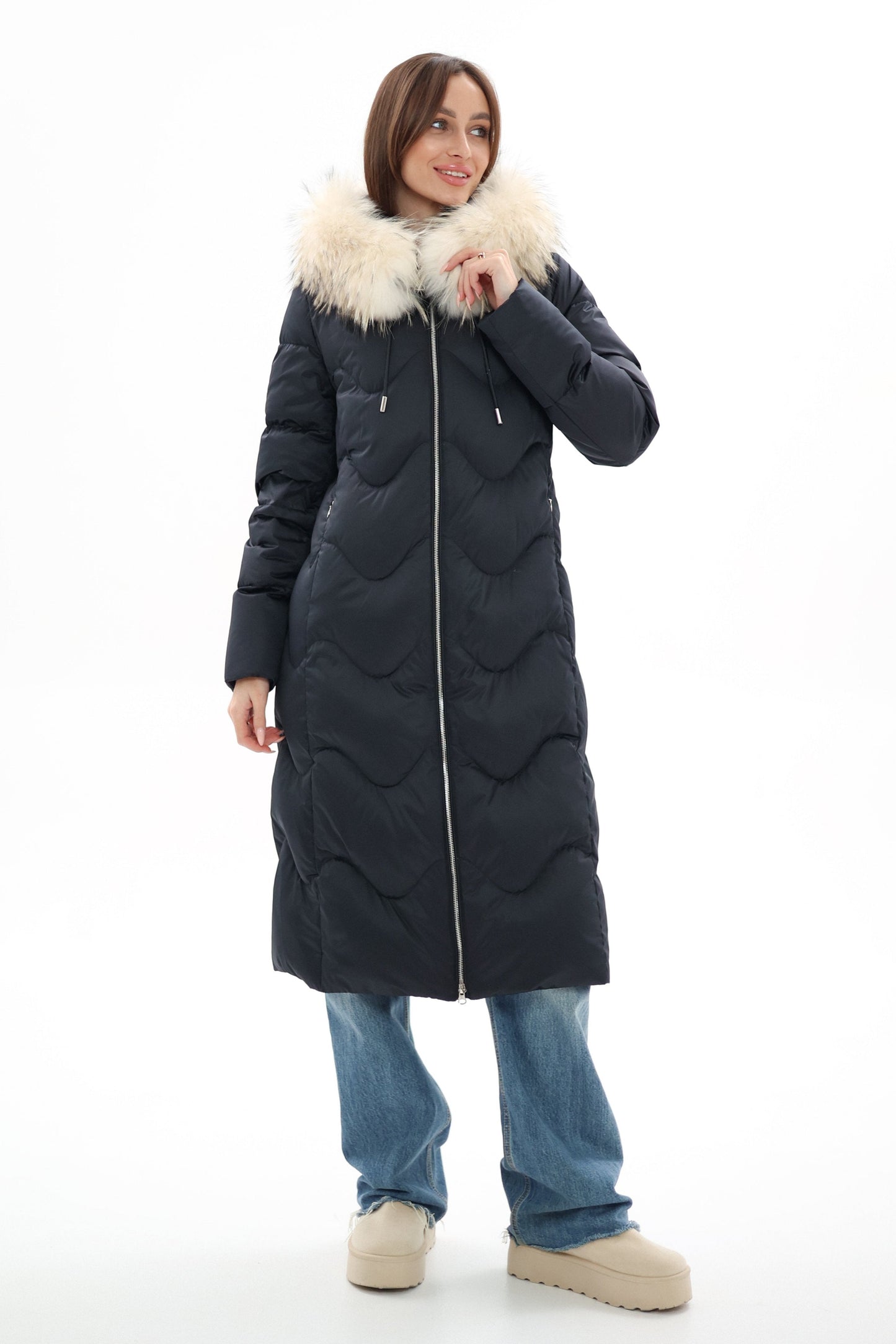 Manteau en duvet avec bordure en fourrure véritable
